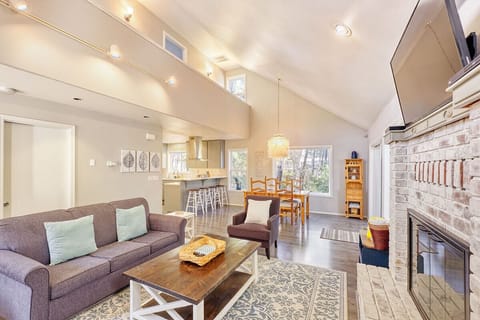 Living room leads right into the dining and kitchen area