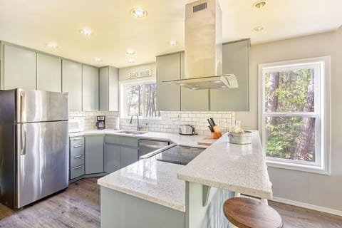 The kitchen if fully stocked for all your cooking needs, just bring your food!