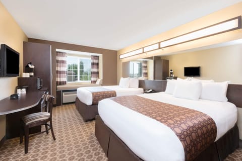 Desk, laptop workspace, blackout drapes, iron/ironing board