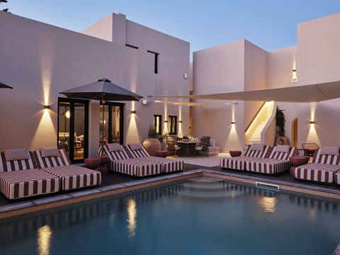 Outdoor pool, open 10 AM to 7 PM, sun loungers