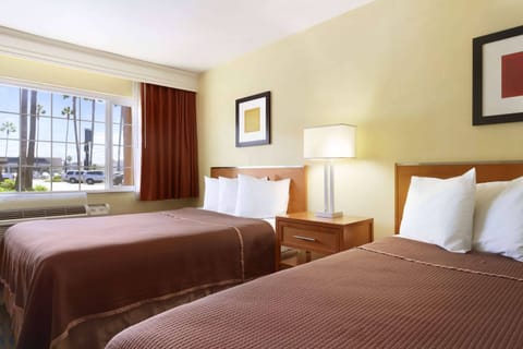 Room, 2 Queen Beds, Non Smoking, Refrigerator & Microwave | In-room safe, desk, laptop workspace, blackout drapes