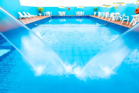 Outdoor pool, open 9:00 AM to 10:00 PM, sun loungers