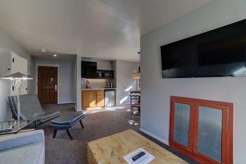 Standard Suite, 1 King Bed with Sofa bed | Living area | 48-inch flat-screen TV with cable channels, TV