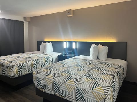 Premium bedding, blackout drapes, free WiFi, bed sheets