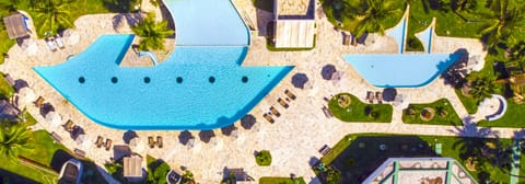 Outdoor pool, open 8 AM to 8 PM, pool umbrellas, sun loungers