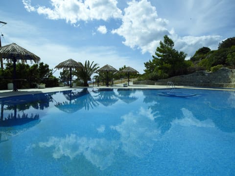 2 outdoor pools, pool umbrellas, sun loungers