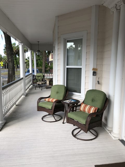 Relax on the breezy wrap around veranda.