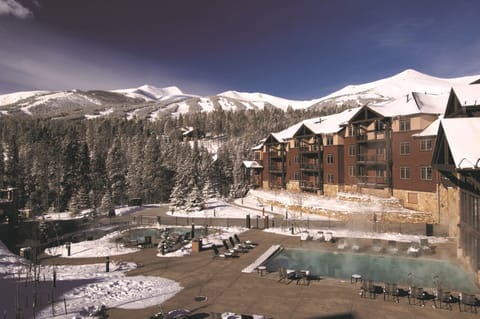 View of outdoor pool and hot tubs.  On-site ski rentals available.  Ski in/out!