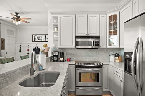 Kitchen is perfect for making meals or enjoying take-out meals or leftovers.