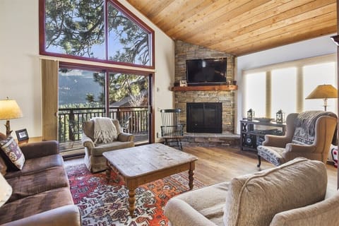 Spacious living room with spectacular views and a gas fireplace