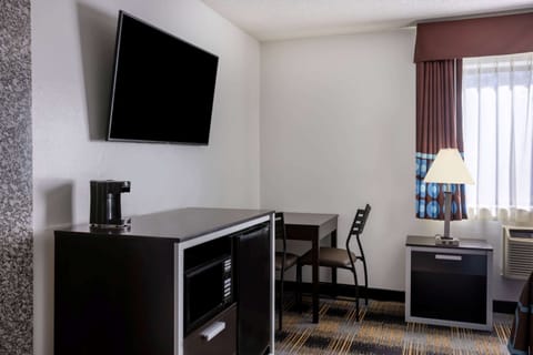 Suite, 1 King Bed, Non Smoking | Desk, iron/ironing board, free cribs/infant beds, rollaway beds