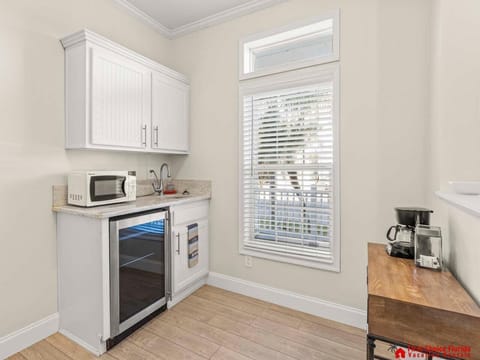 Bright kitchenette with modern appliances and natural light