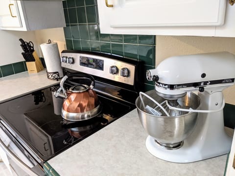 Our kitchen has many kitchen appliances such as a KitchenAid Mixer, Keurig&more.