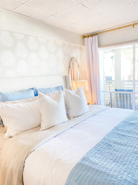 New bed with luxurious linens and pillows for extra comfort.