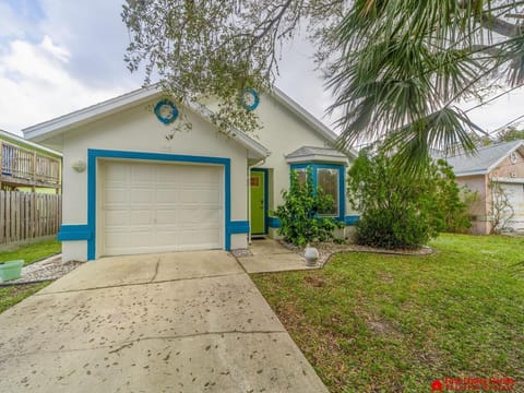 Charming home with cozy front yard and private driveway