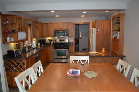 Dining area seats 8. Granite counters and heated stone floors.