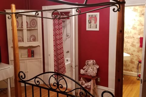 Red Suite - Four Post Canopy Wrought Iron Bed