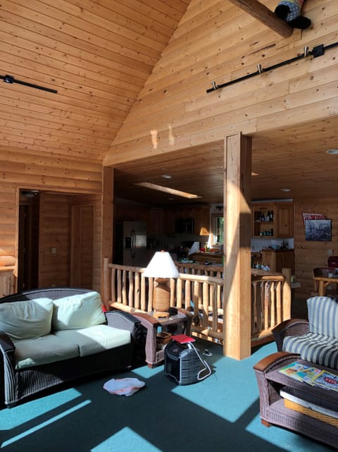 Living room and steps to basement