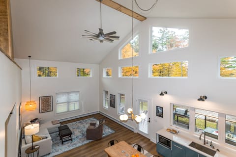 Vaulted ceilings and big windows give the space an open, airy feeling