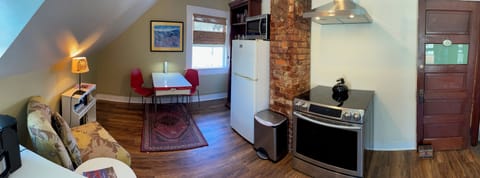 Full-size fridge, microwave, toaster, cleaning supplies