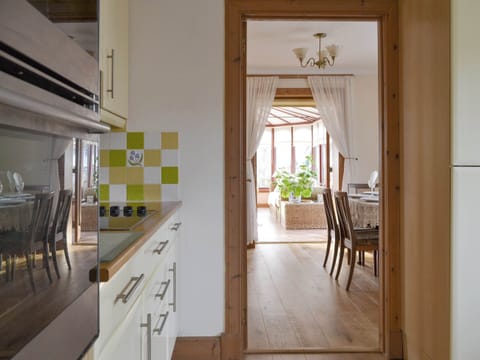 Well-equipped fitted kitchen | Rowan Cottage, Aviemore