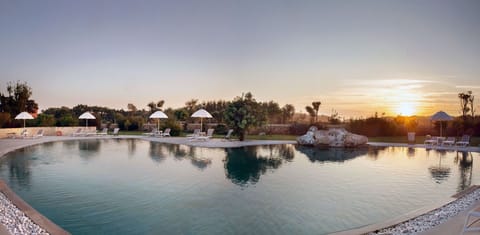 Water, Sky, Swimming Pool, Property, Reflection, Water Resources, Reflecting Pool, Tree, Home, Resort