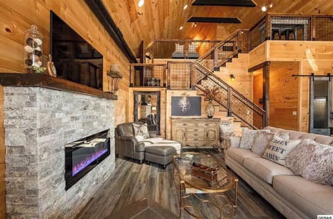 comfortable living room with large windows to enjoy the river view.