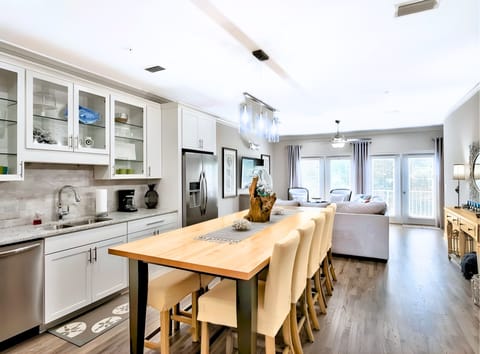 2nd Floor - 🍽️ Dining Area for 8, fully equipped kitchen with granite countertops and stainless steel appliances