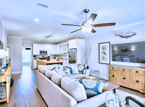 Spacious Living room  with sectional sofa and flat-screen TV