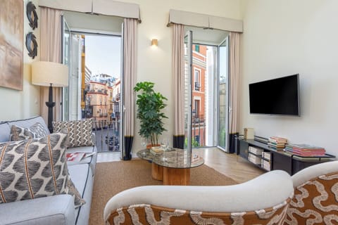 Apartment (2 Bedrooms) | Living area | 32-inch TV with cable channels