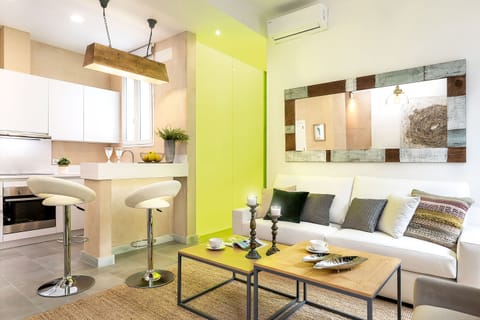 Apartment (2 Bedrooms) | Living area | 32-inch TV with cable channels