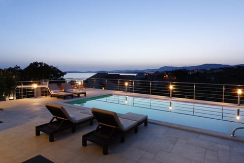 Seasonal outdoor pool, pool umbrellas, sun loungers