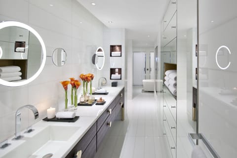 Designer toiletries, hair dryer, bathrobes, slippers