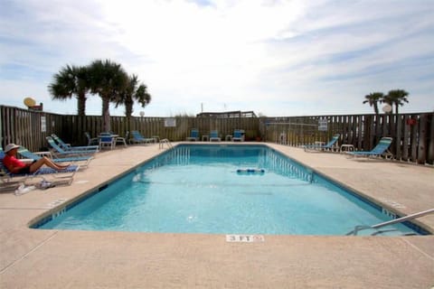 A refreshing dip in the pool feels great after building sandcastles all day.