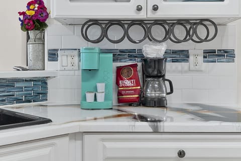 Start your day with a brew! Our kitchen boasts both a coffee machine and a Keurig,