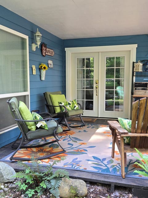 Covered front deck and  entry.