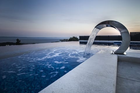 Seasonal outdoor pool, pool umbrellas, sun loungers