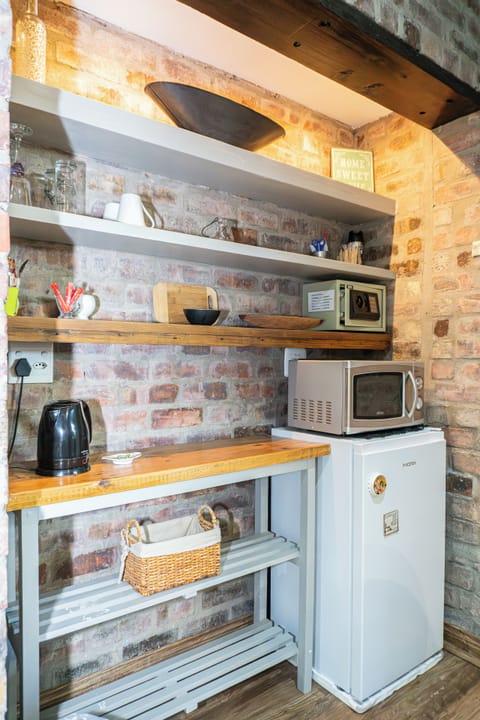 Honeymoon Room, 1 Bedroom (R3) | Private kitchen | Fridge, coffee/tea maker, electric kettle, highchair