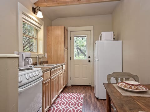 Looking from the front door through the kitchen to the side door