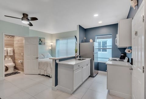 #4 = Seahorse Hideaway = 1 bedroom w/ queen sized bed and a futon couch | Living area | TV