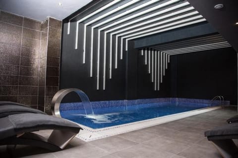 Indoor pool, sun loungers