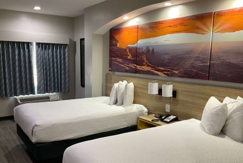 Pillowtop beds, desk, laptop workspace, blackout drapes