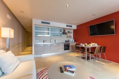 Apartment, Pool Access, Sea View | Living area | Flat-screen TV