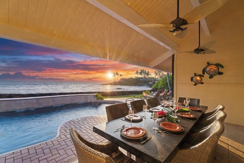 Savor sunset dinners by the pool as ocean breezes and golden light surround you.