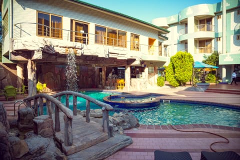 Outdoor pool, pool umbrellas, sun loungers