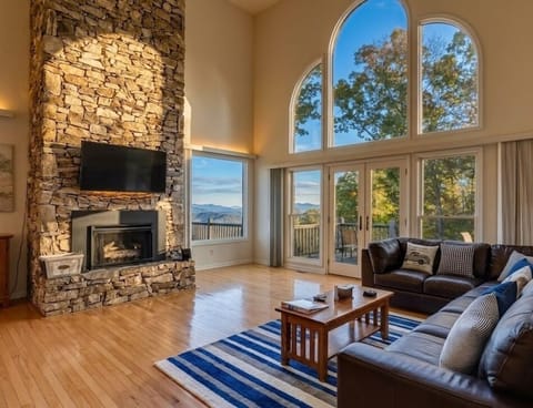 Living room w/ fireplace & View