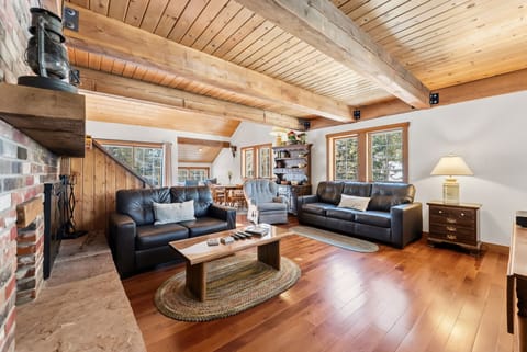 Living room: Wood-burning fireplace, Smart TV, forced heat, no A/C