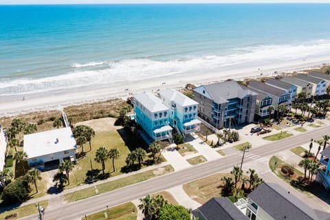 Beachfront vacation rental offering direct beach access with pristine white sand and turquoise waters just steps from your door.
