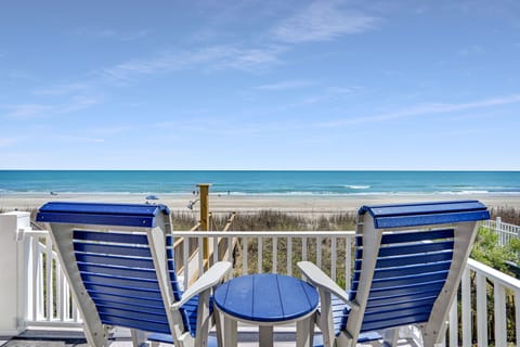 Sink into your private beachfront chairs and let ocean waves wash your worries away from this perfect seaside perch.