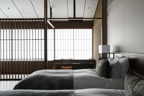 Deluxe Room (Premium) | Down comforters, in-room safe, individually decorated, desk
